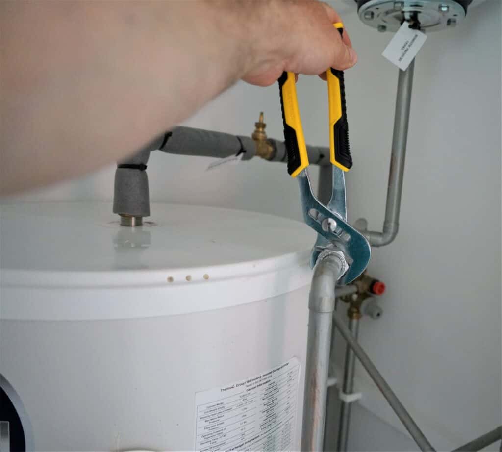 Plumber Replacing the Water Heater
